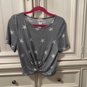 Cropped blue and white striped shirt with stars and knot